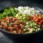 high protein carnitas bowls - featured image